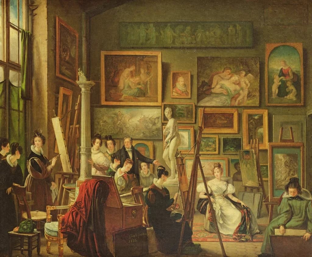 A bright studio space with sculptures and works on paper